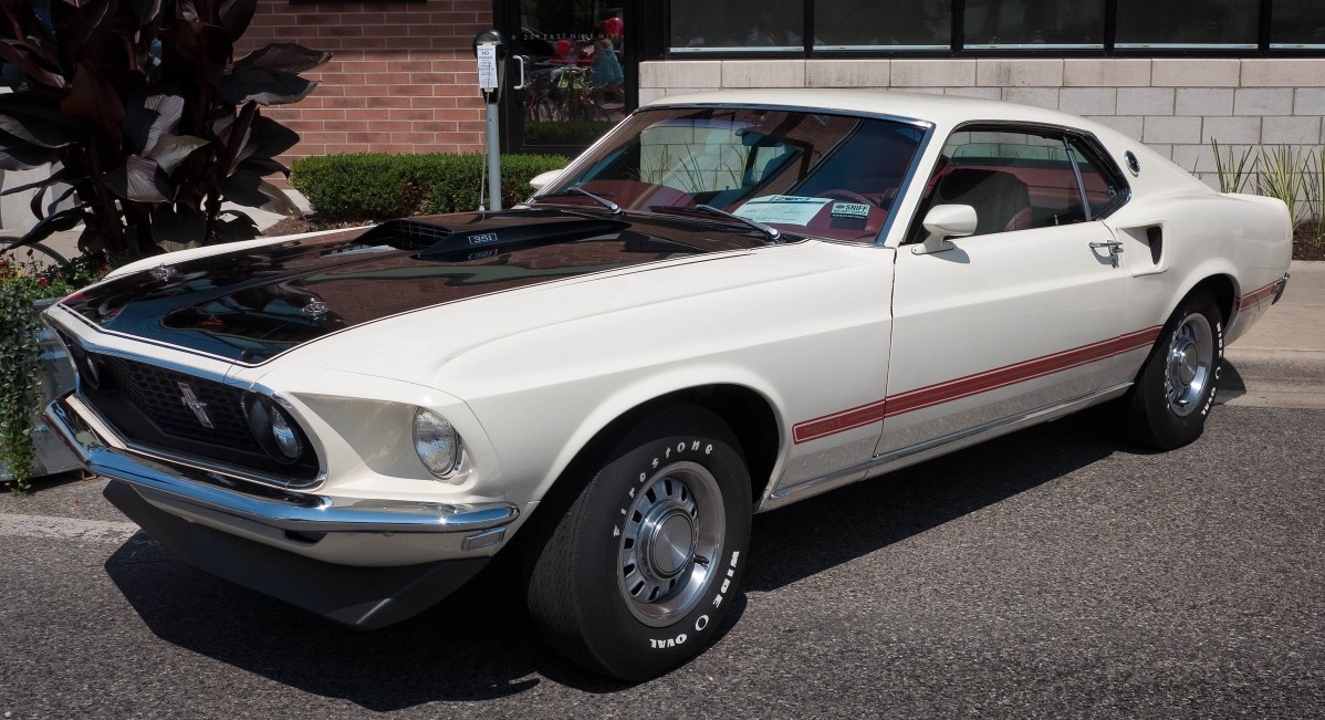Picture of a red white and black 1969 ford mustang mach 1